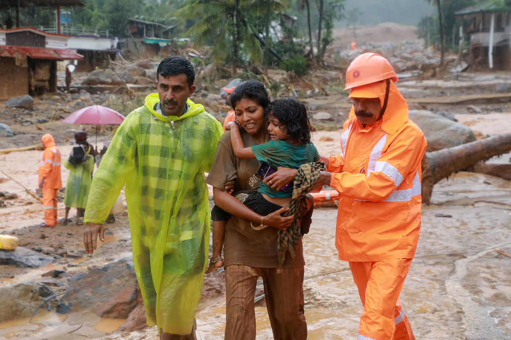 Sixty-three killed, dozens trapped in India landslides