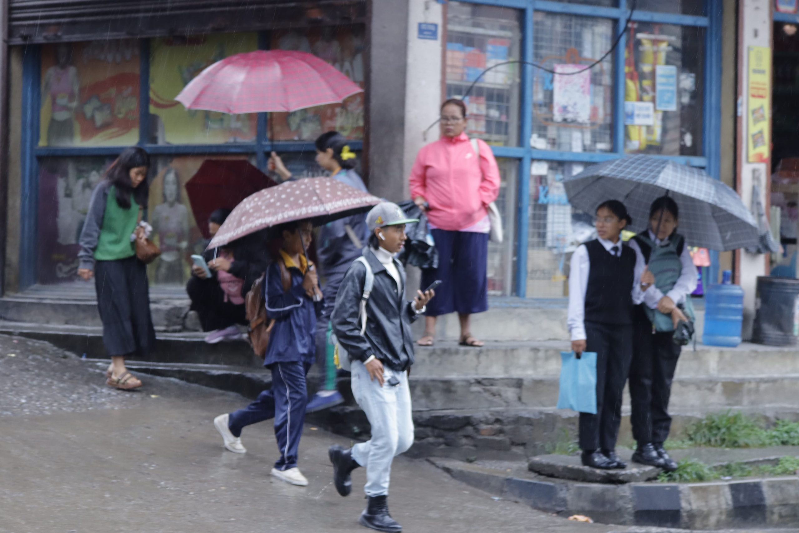 September rain disrupts daily life (photos)