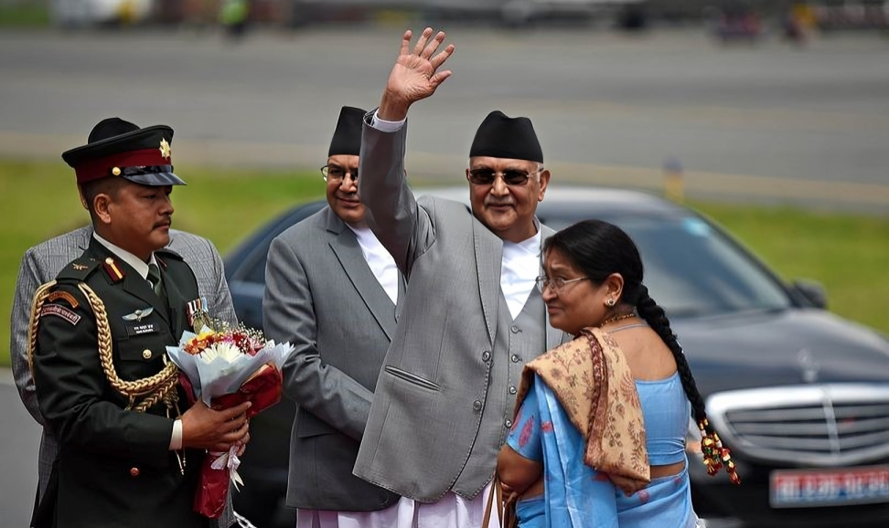 PM Oli returns home