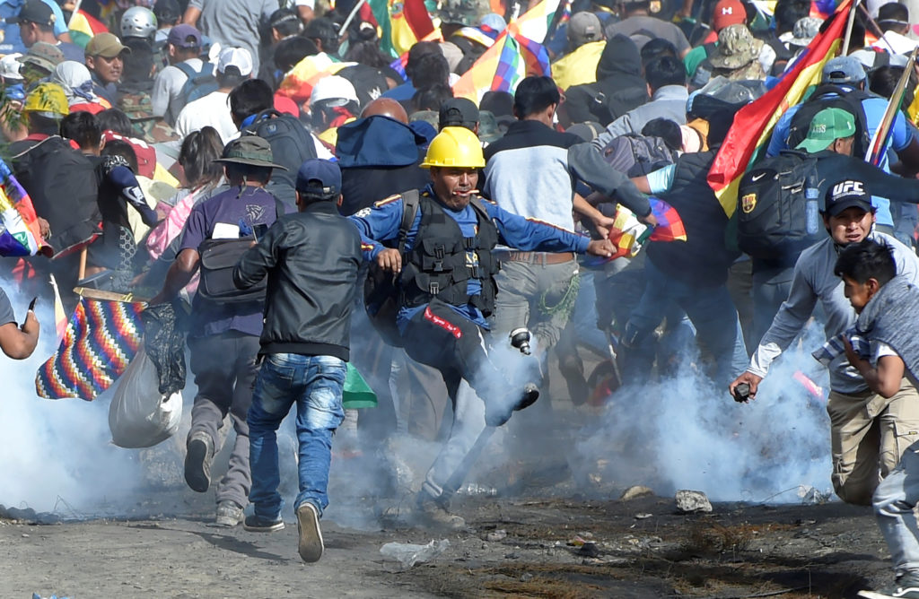 13 injured in clashes between Bolivian police, protesters