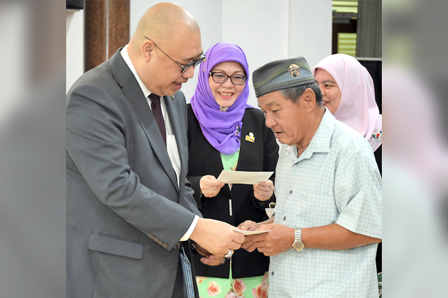 Brunei offers financial aid for fire, storm victims