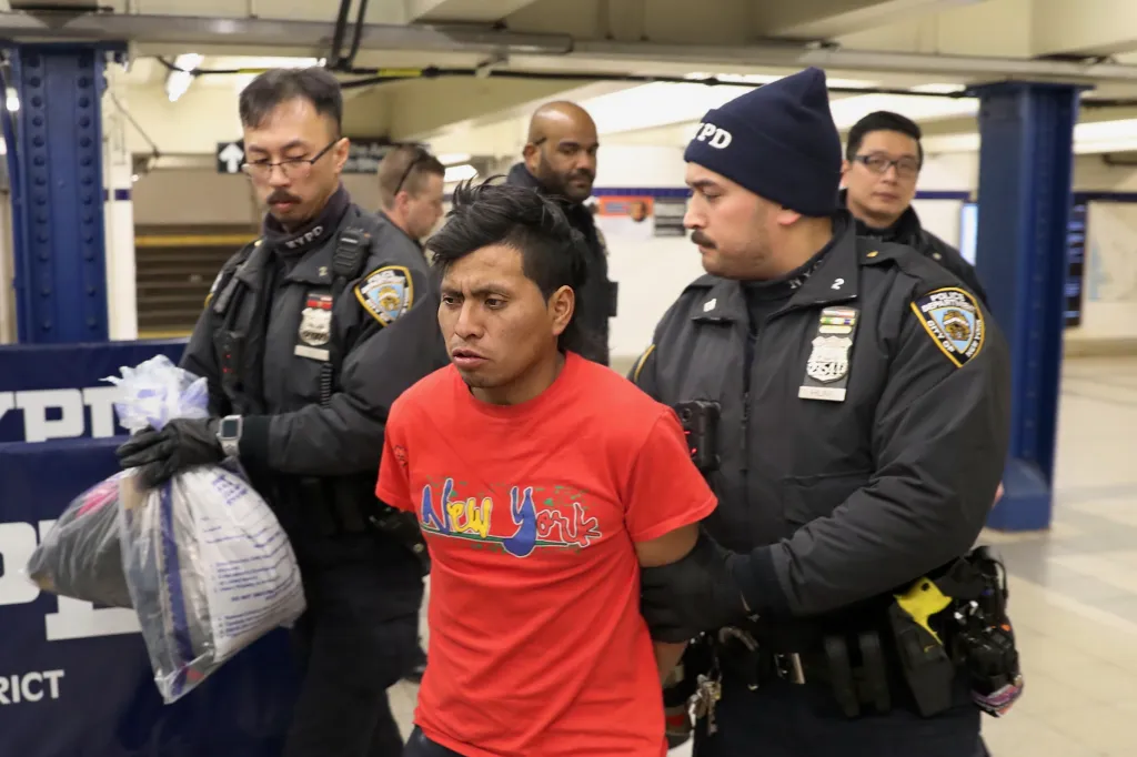 New York police arrest man for setting subway rider on fire