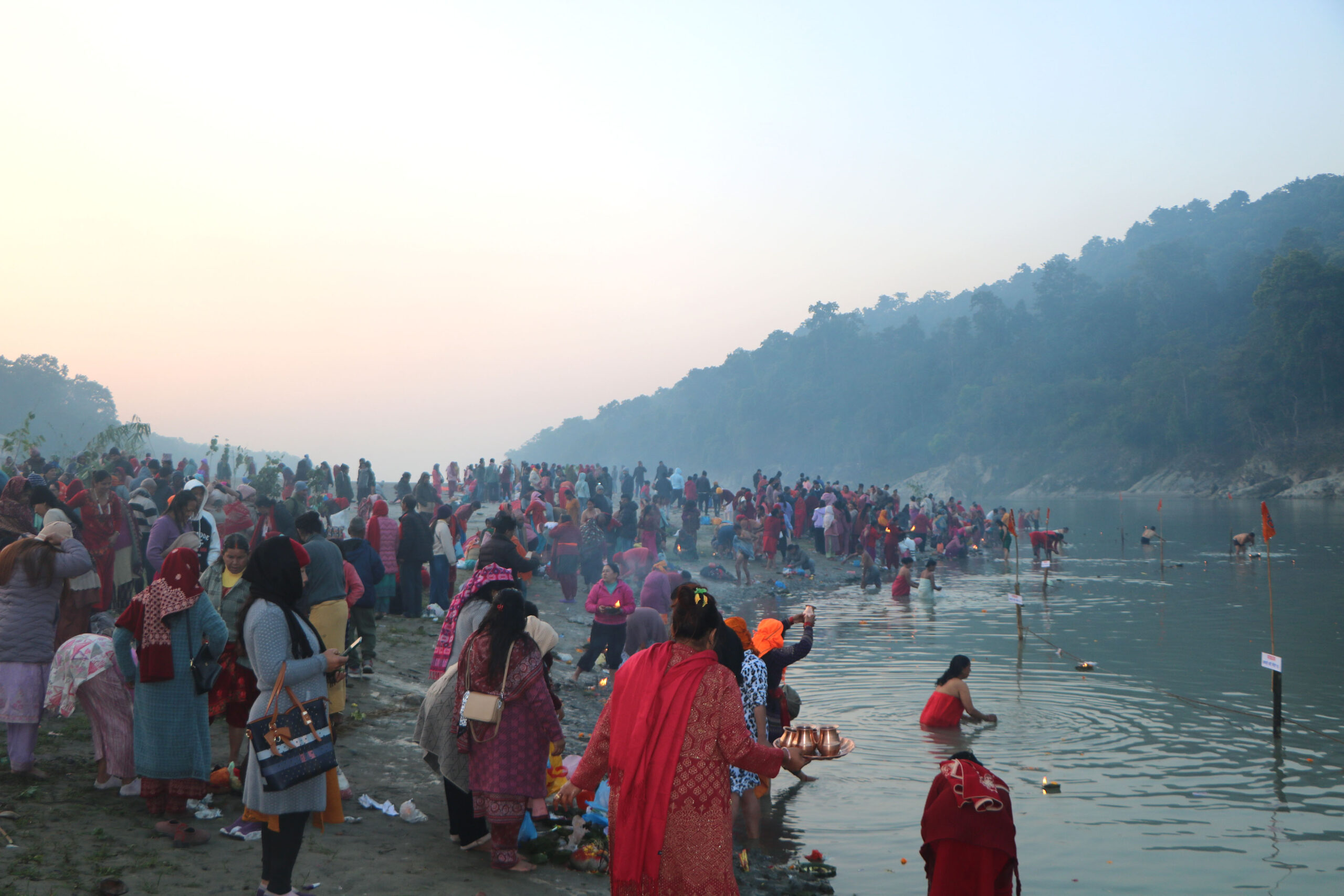 Devotees throng Devghat to take holy bath