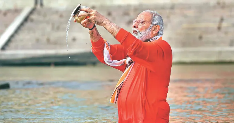 PM Modi arrives in Prayagraj to take holy dip at Sangam