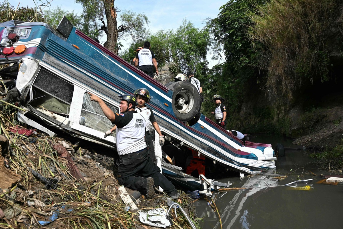 51 dead as bus plunges into river in Guatemala City