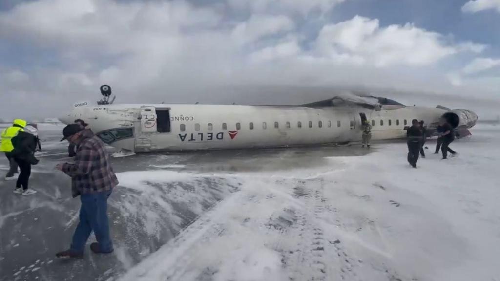 Delta flight overturns on landing in Toronto, all rescued