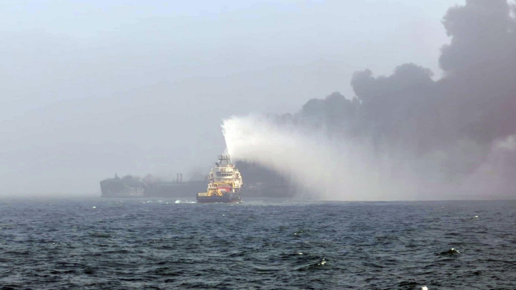 Fires still burning and one missing after tanker collision