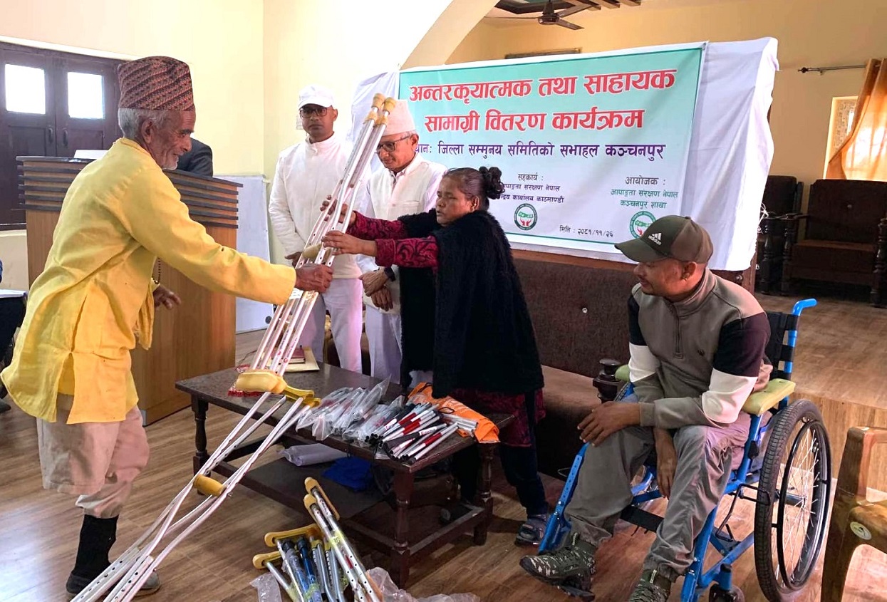 Muktinath Bikas Bank distributes crutches to disabled individuals