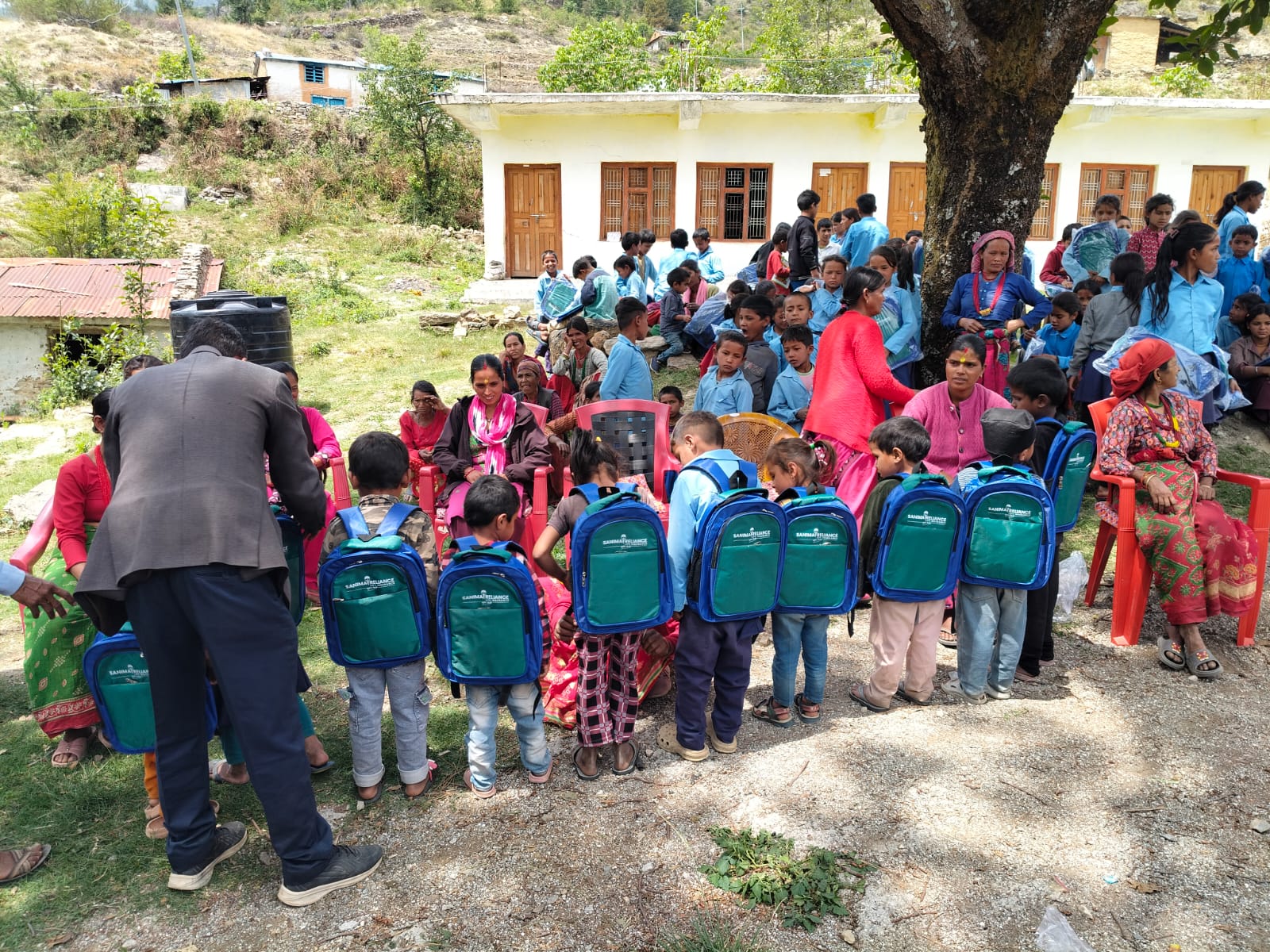 Sanima Reliance provides school bags to Bajura students
