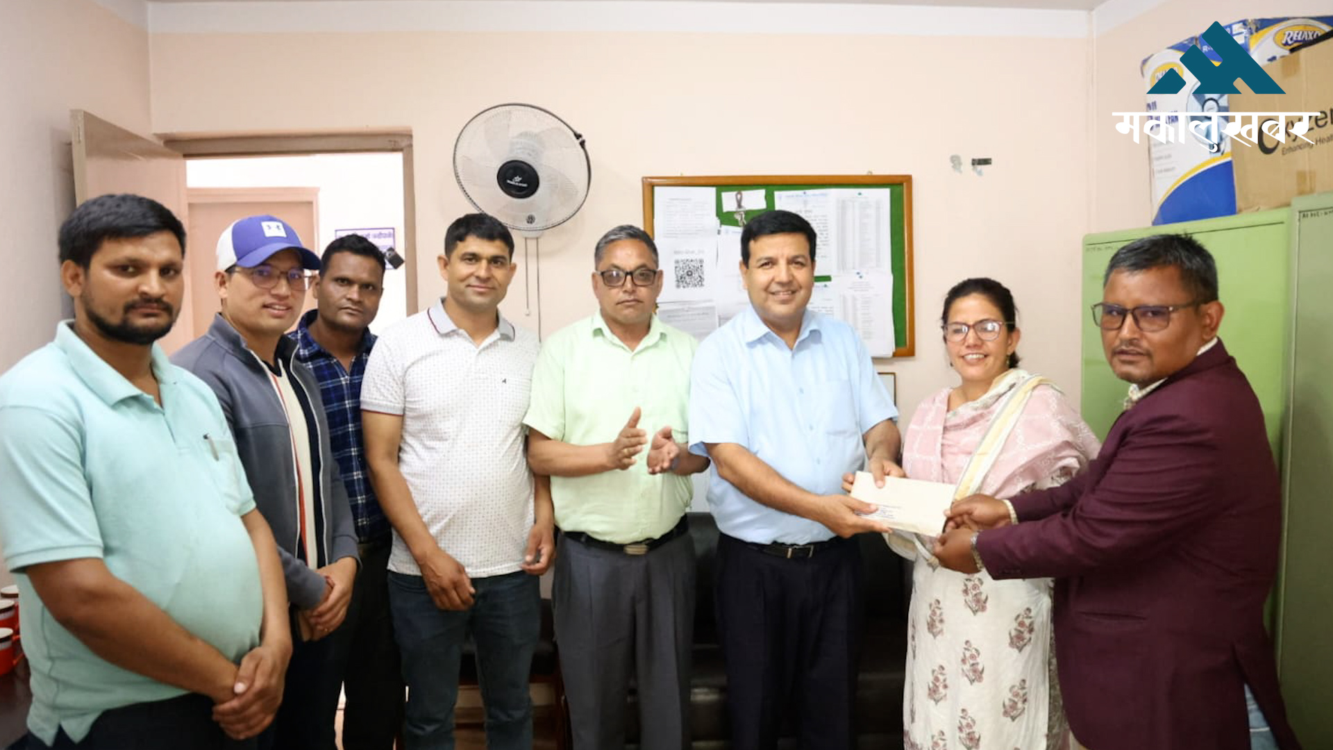 Dr. Sunil Sharma provides financial aid to Humla fire victims