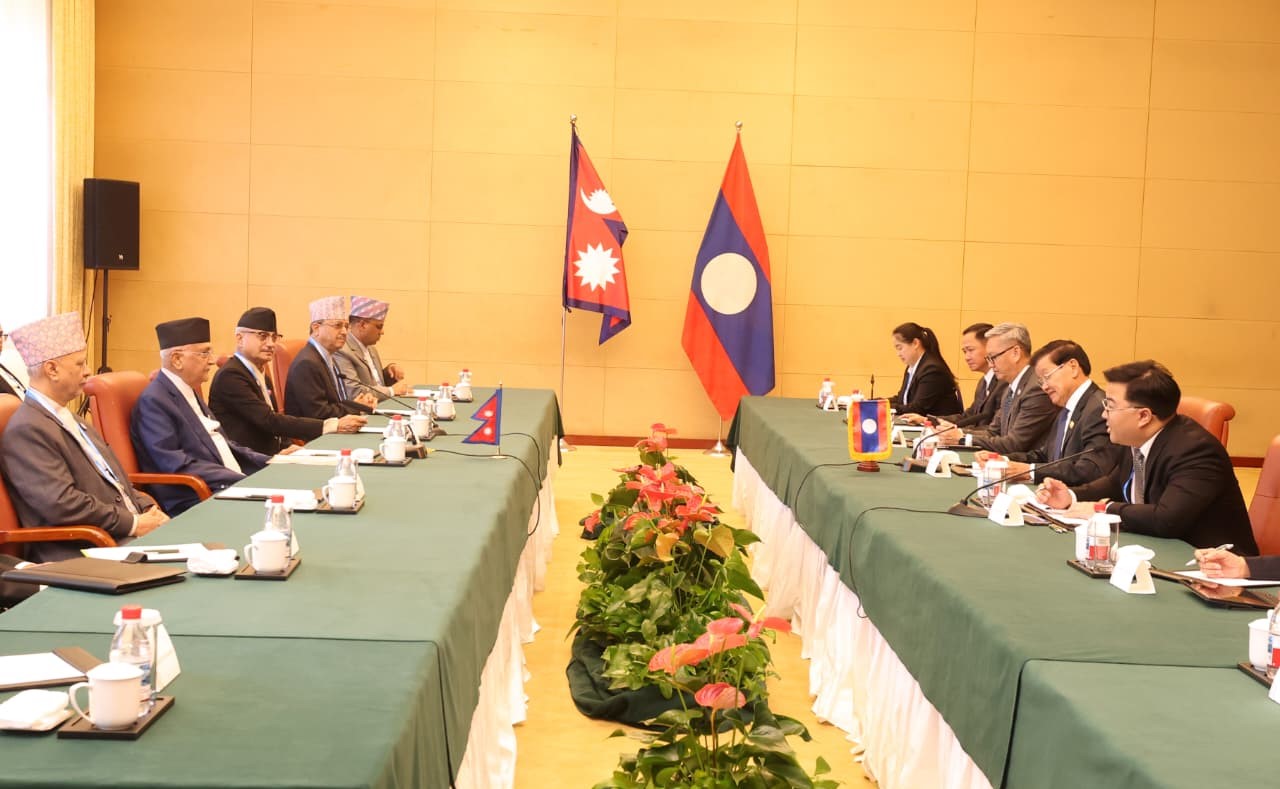 PM Oli meets with Lao PDR President in Tianjin