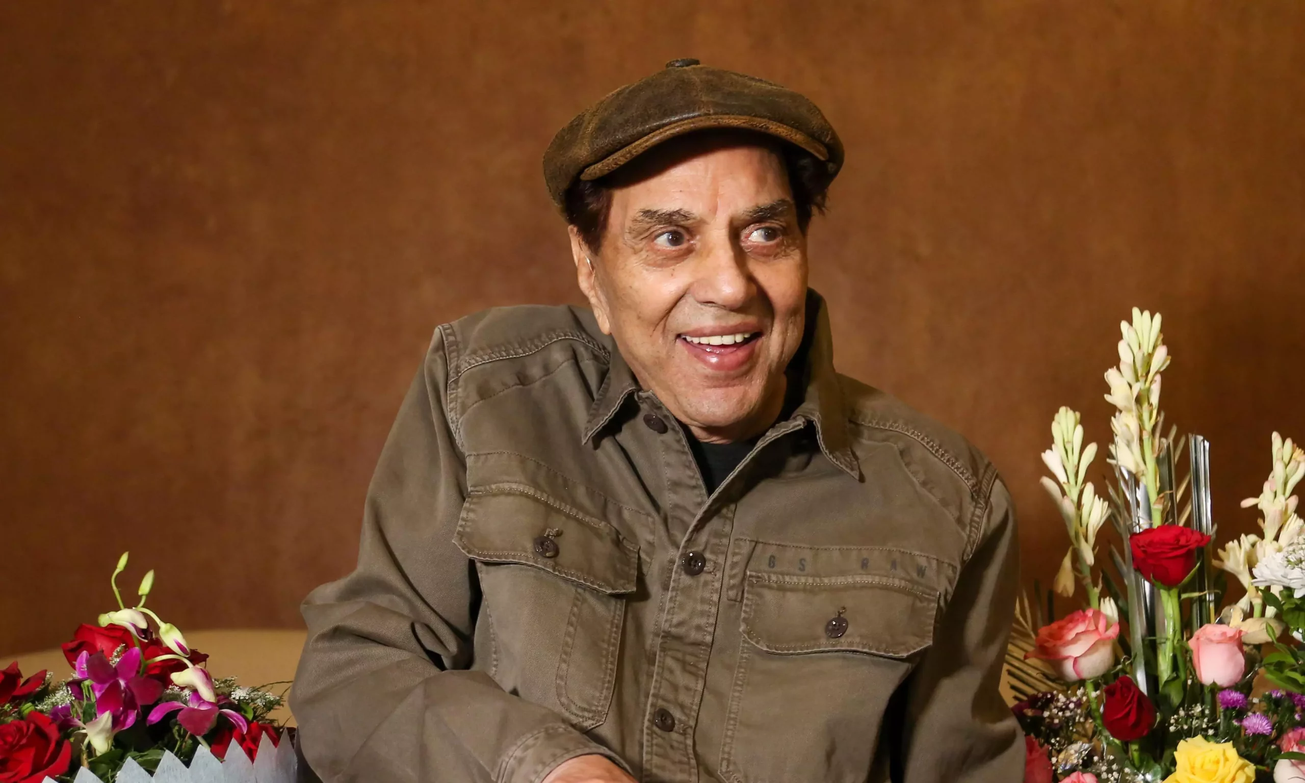 What sparked the rumor that Dharmendra had died?