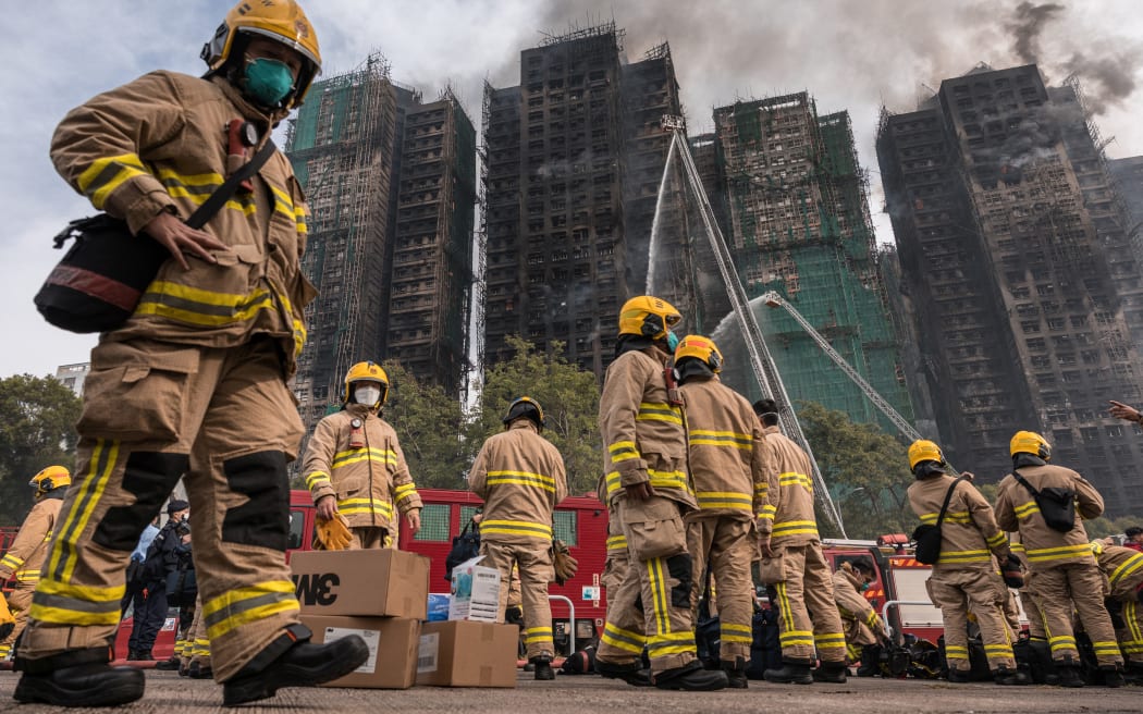 Hong Kong high-rise fire kills 94, dozens still missing