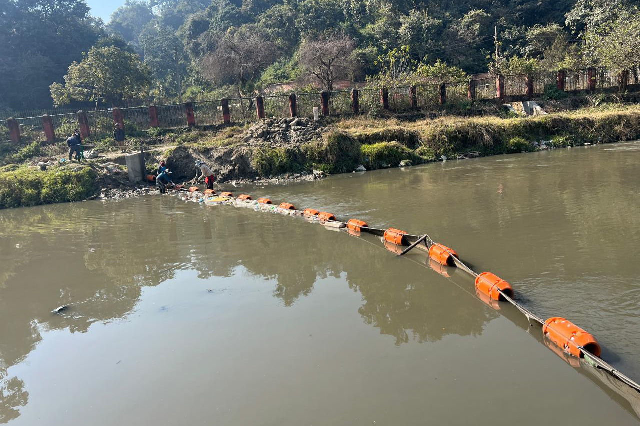 Trash barrier installed to capture floating waste in Bagmati River