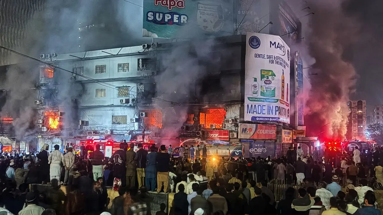 Death toll from shopping mall fire in southern Pakistan rises to 14