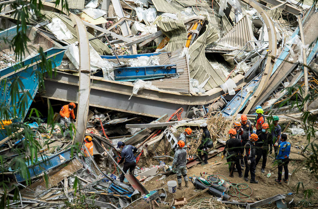 Death toll in central Philippine landfill collapse rises to 11