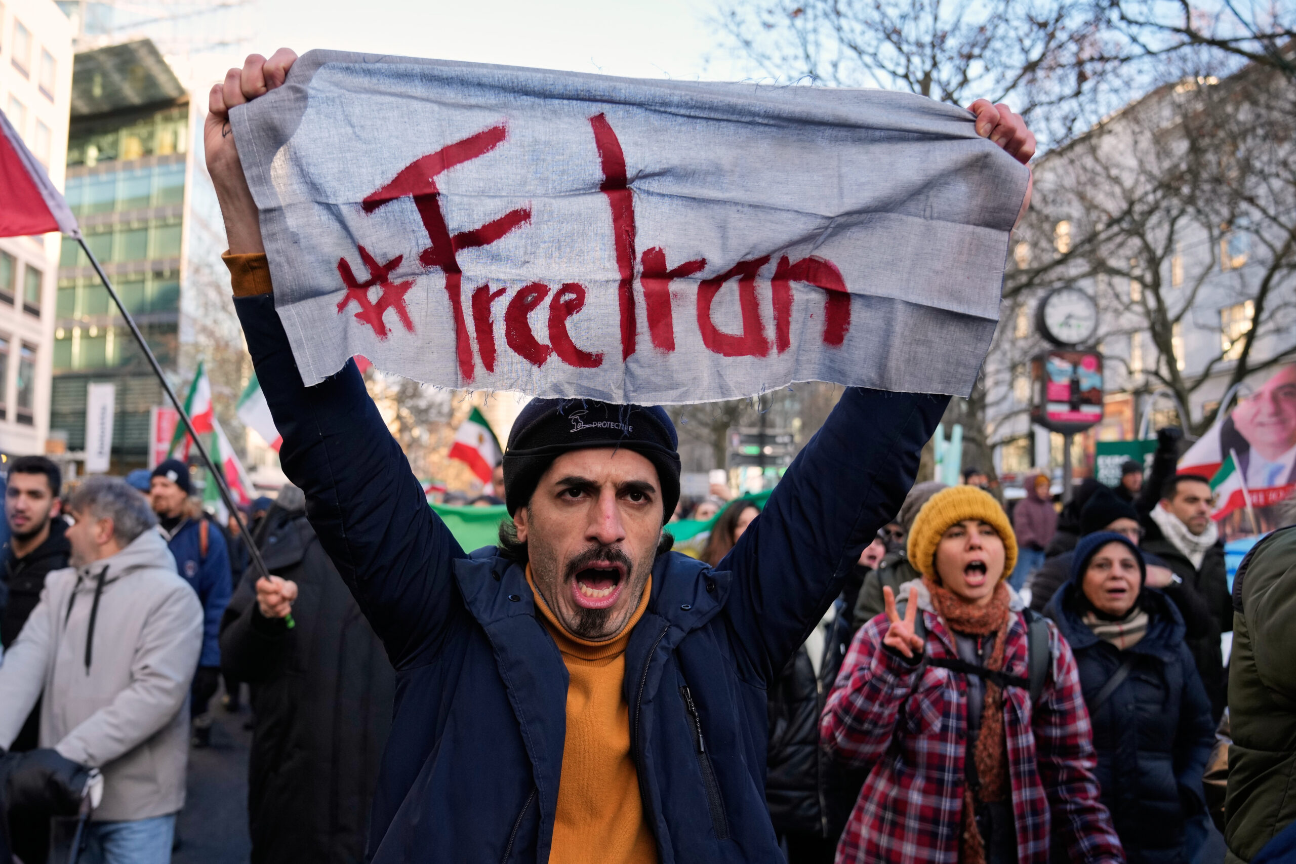 The Latest: Iran eases some restrictions, allows calls abroad as death toll spikes