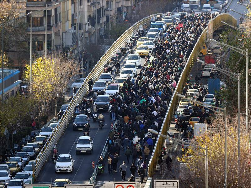 Iran protests sweep nation despite internet shutdown as state TV warns of ‘casualties’