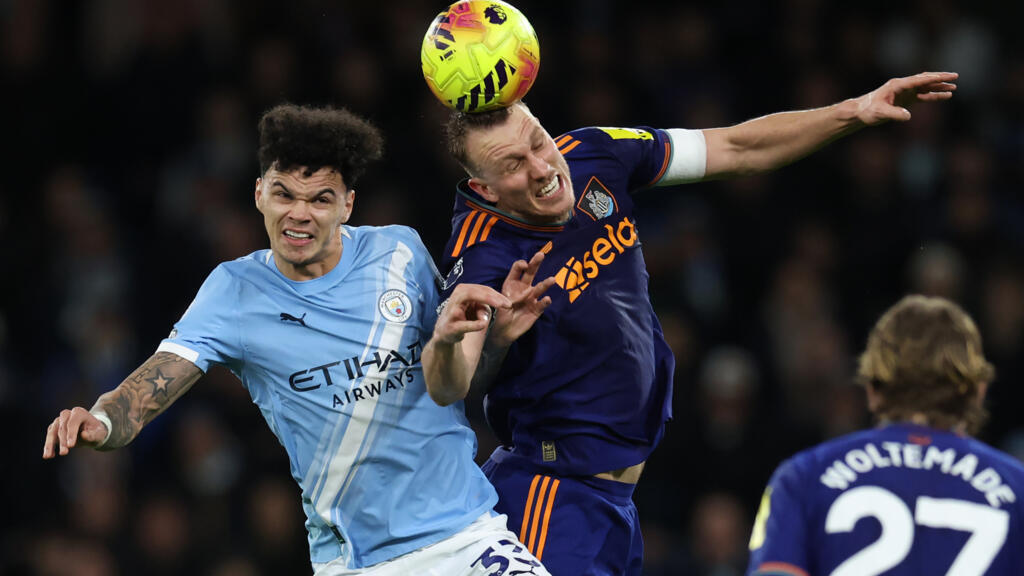 City beat Newcastle 2–1 to turn up heat on Arsenal