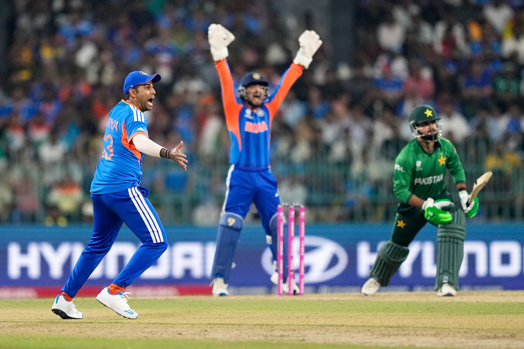 India crushes Pakistan by 61 runs, secures Super 8 spot (photos)