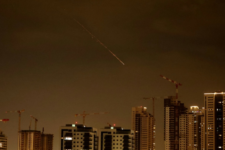 Iran fires missile salvo after Trump signals progress in talks