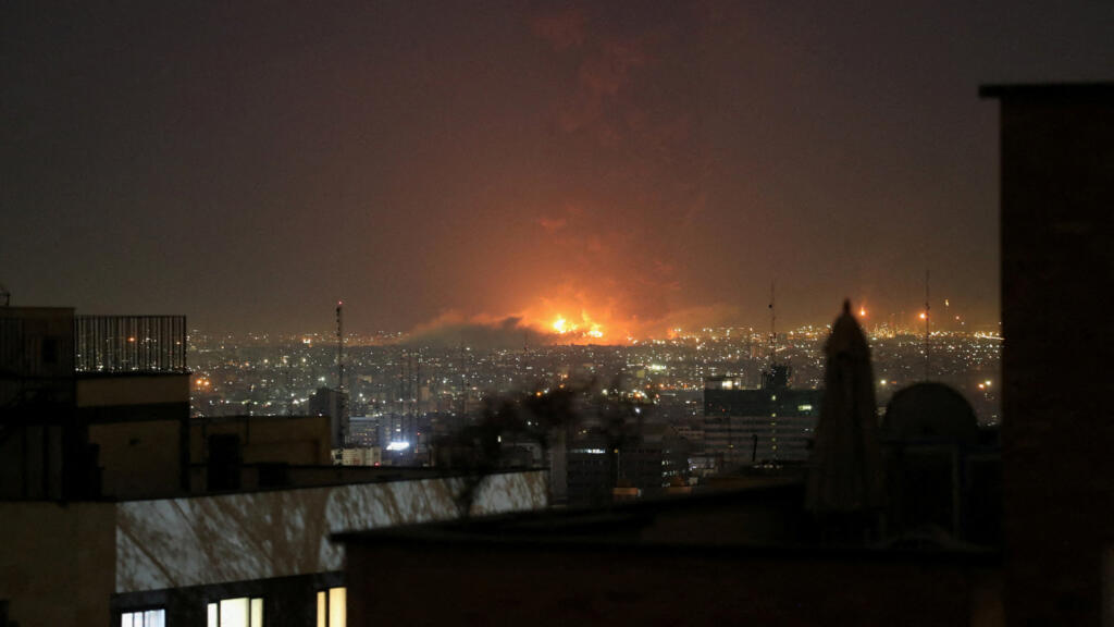Iran says can fight for months as Israel strikes Beirut hotel