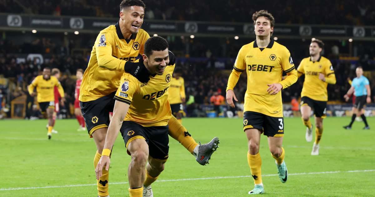 Wolves stun Liverpool with last-minute deflected strike