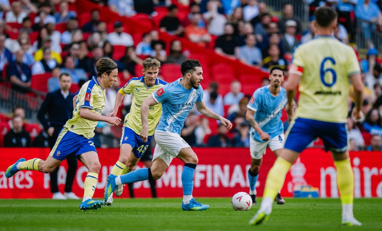 City reach fourth straight FA Cup final with late comeback win