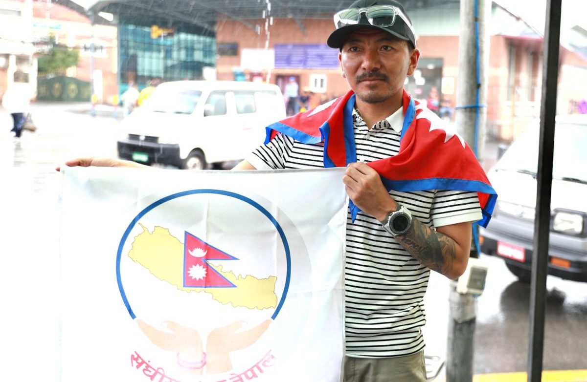 MP Sherpa returns after Everest summit