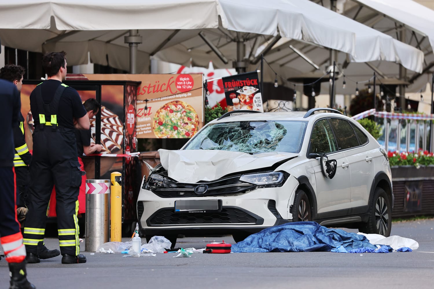 Two killed and many injured after car driven into crowd in German city of Leipzig