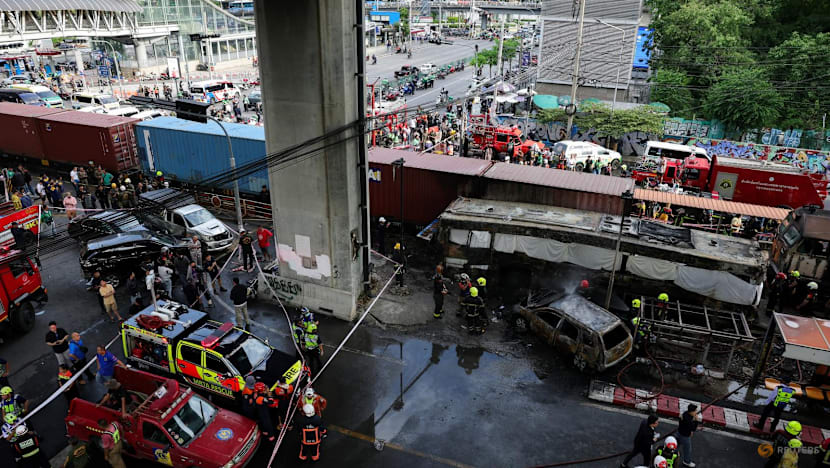 8 killed as train hits bus in Bangkok crossing crash