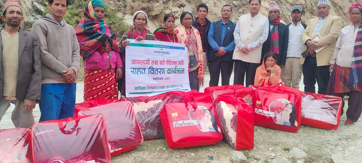 Sanima Reliance Life Insurance distributes blankets to fire & flood victims in Kalikot