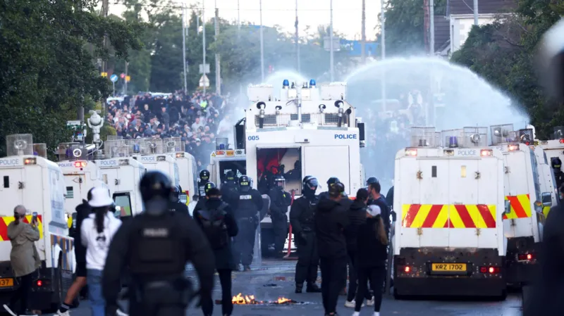Water cannon fired in latest disorder after Belfast knife attack