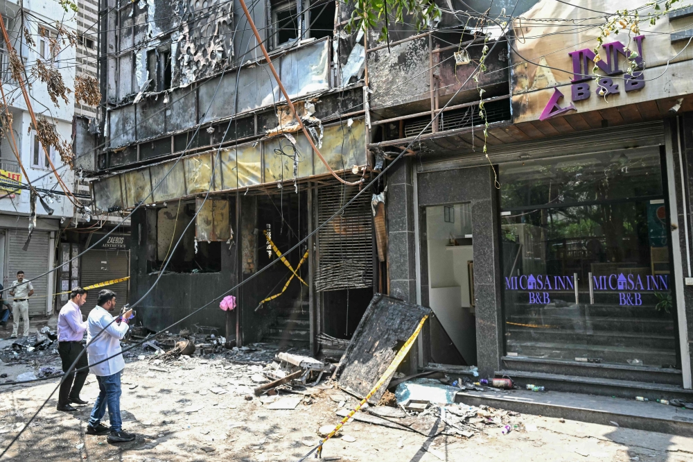 Indian police arrest hotel owner after deadly fire