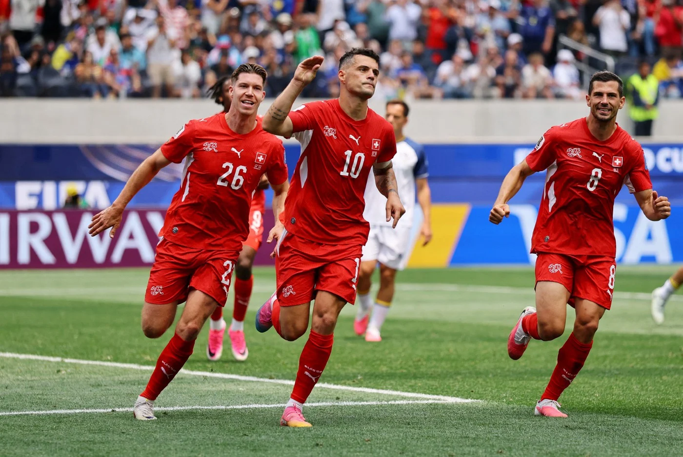 Switzerland hammer Bosnia 4-1 to top Group B