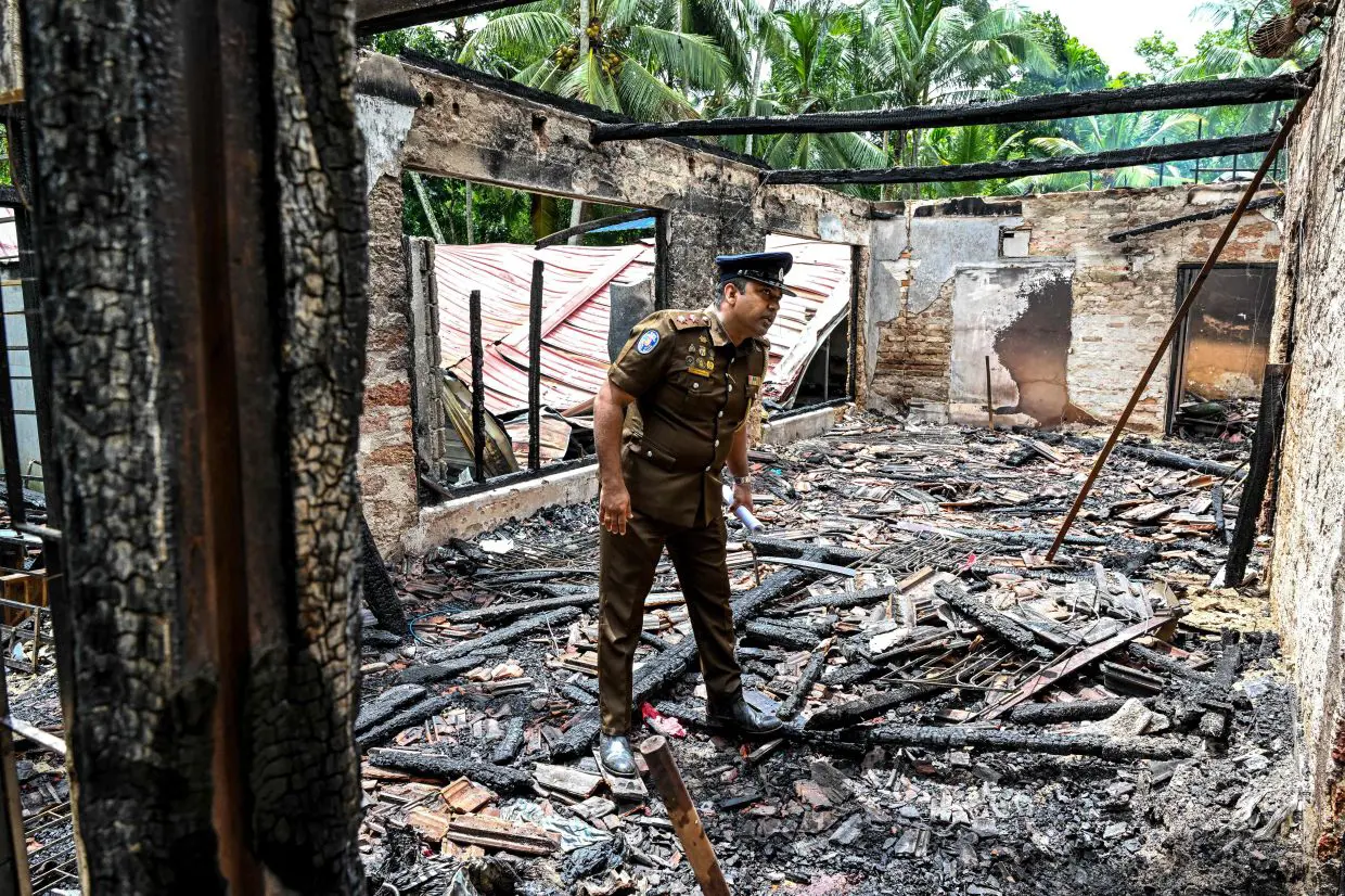 Sri Lanka care home manager arrested after fire kills 12