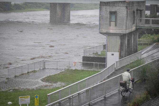 Heavy rain from tropical storm raises flood risks in the Tokyo region